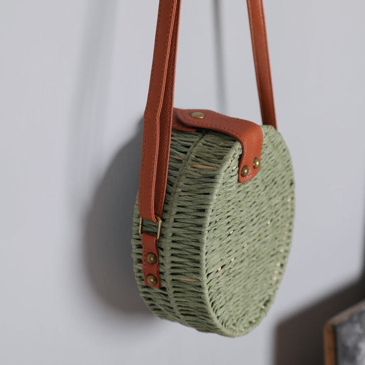Round basket bag with leather accents Kalsten