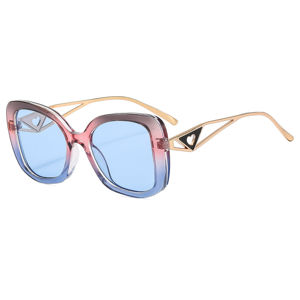 Ladies fashionable oversized sunglasses with luxurious heart detail Kalsten