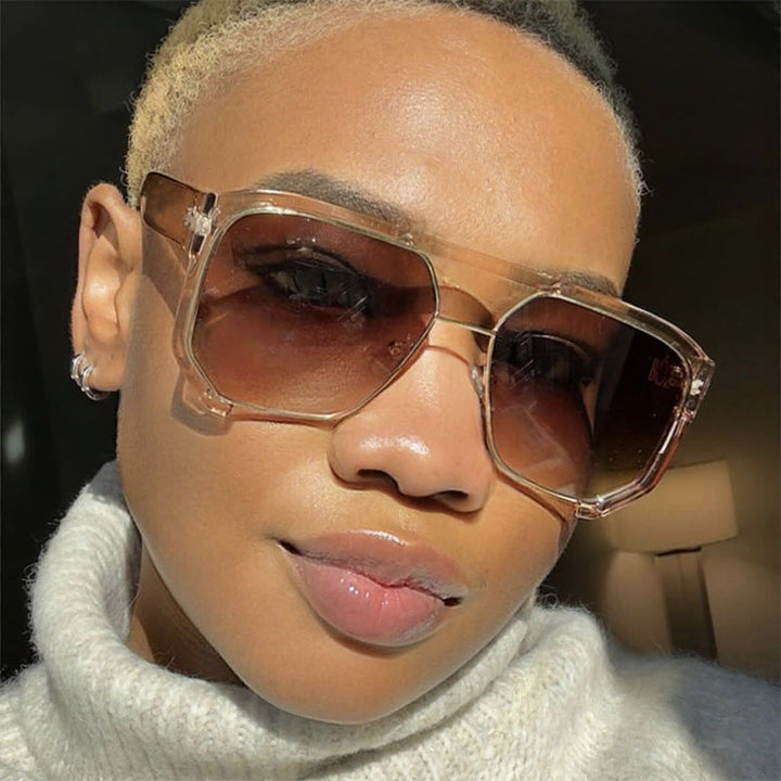 Ladies fashionable oversized sunglasses with elegant, faceted frame construction Kalsten