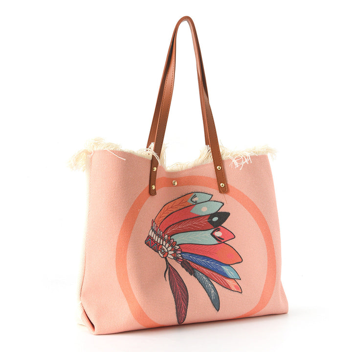 Beach bag with floral pattern and fringes Kalsten