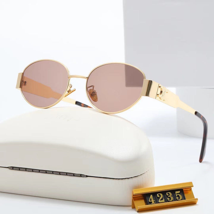 Women elegant oval sunglasses with gold-colored frame Kalsten