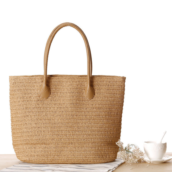 Spacious straw shopper with leather carrying handles Kalsten