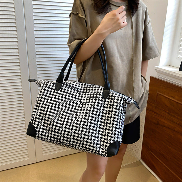 Fashionable handbag in timeless houndstooth pattern Kalsten