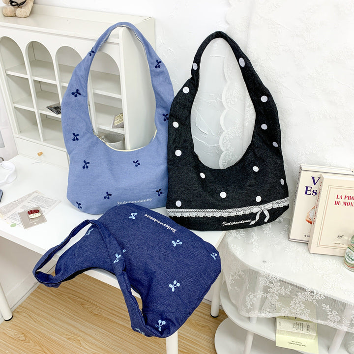 Comfortable shoulder bag with original embroidery motif Kalsten