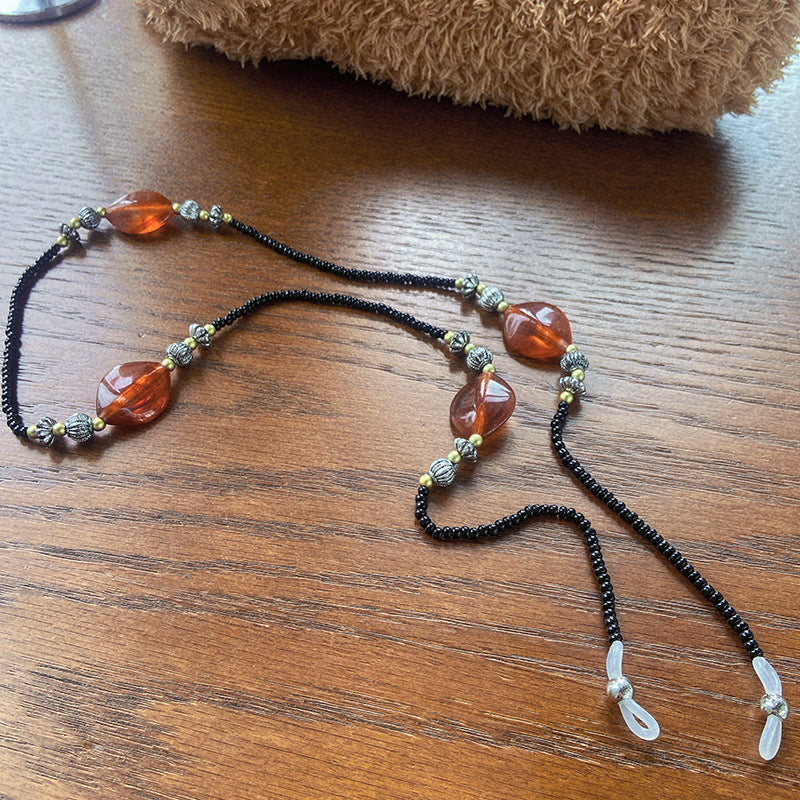Stylish glasses holder chain with colorful accents Kalsten