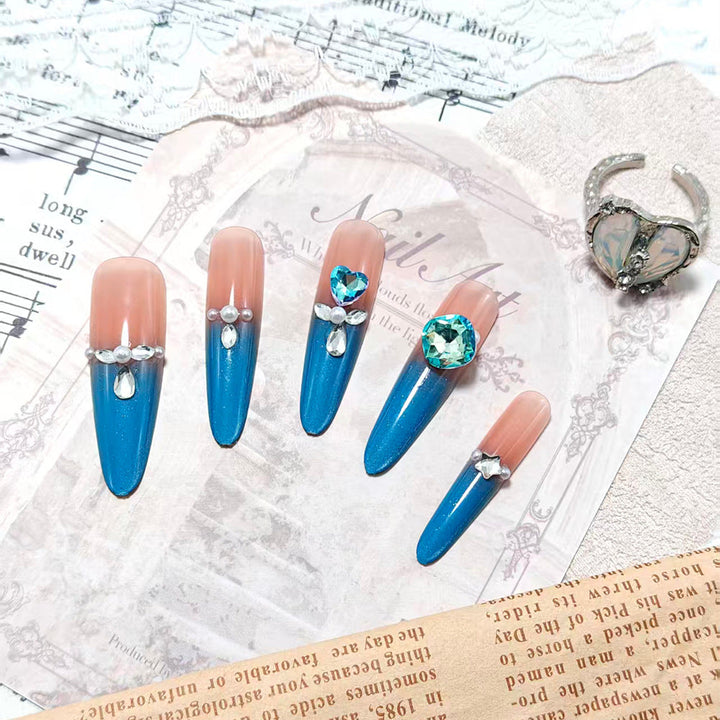 Artificial nails with glitter and rhinestone embellishments Kalsten