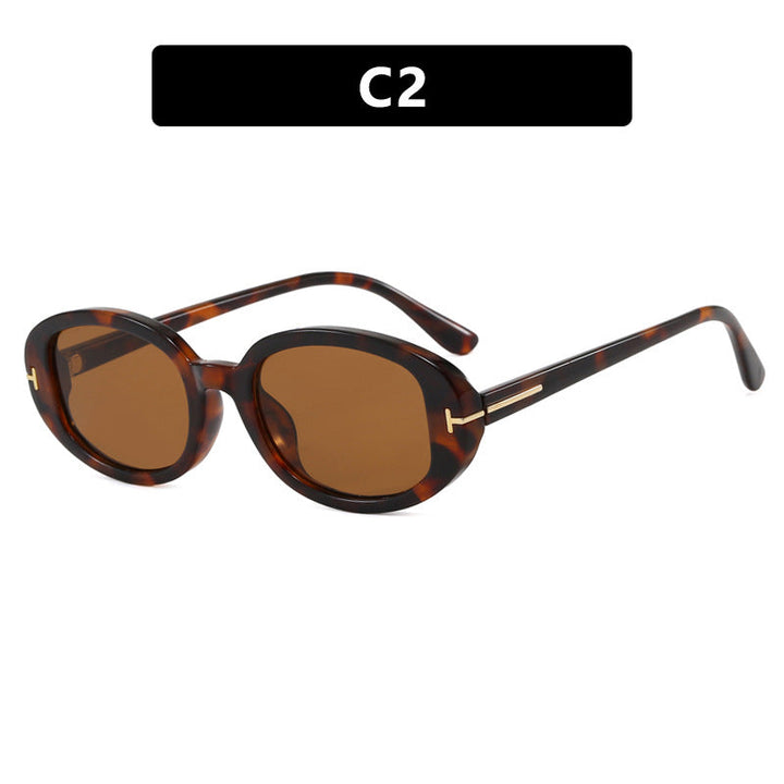 Ladies stylish oval sunglasses with golden details Kalsten
