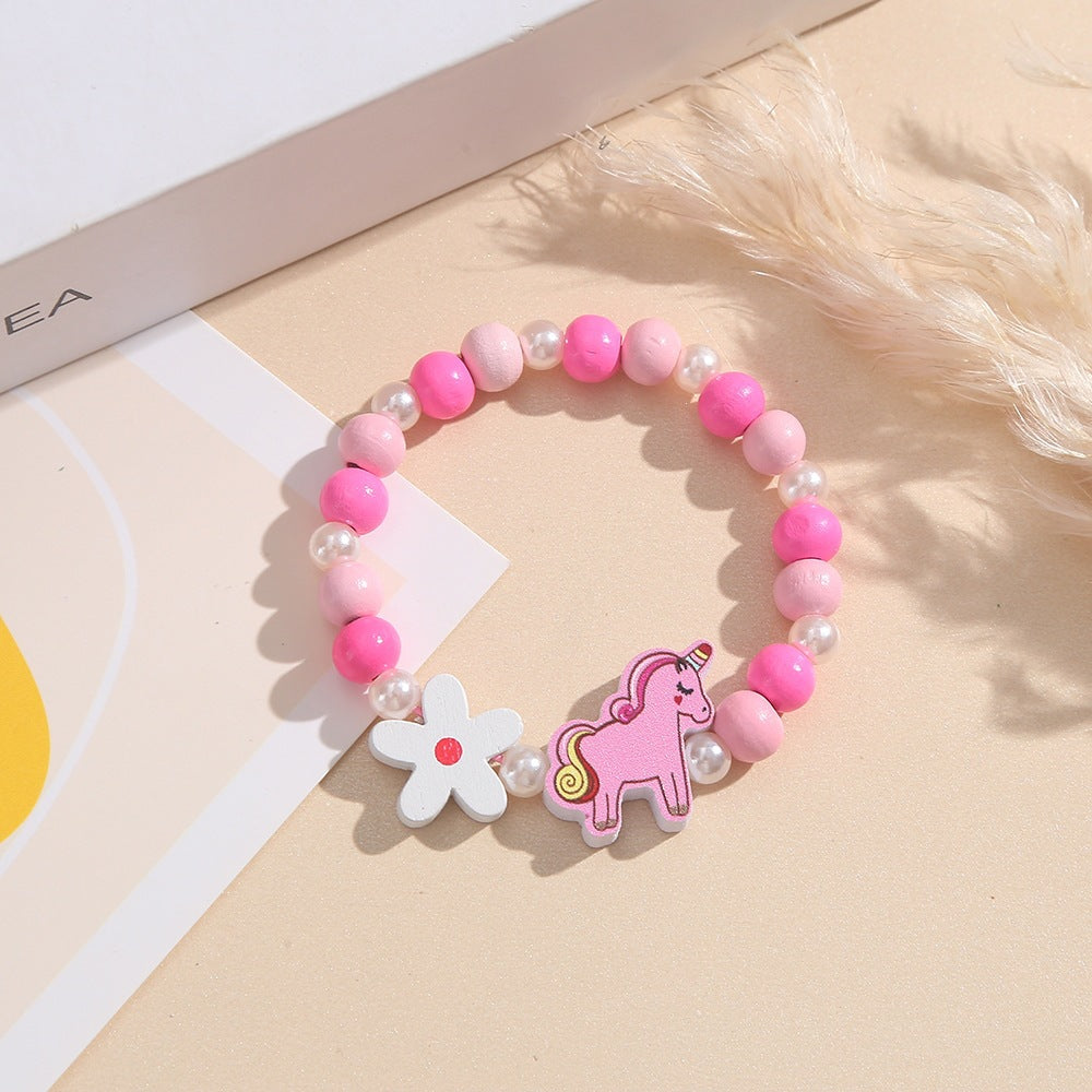 Playful children's bracelet with unicorn and flower motif Kalsten