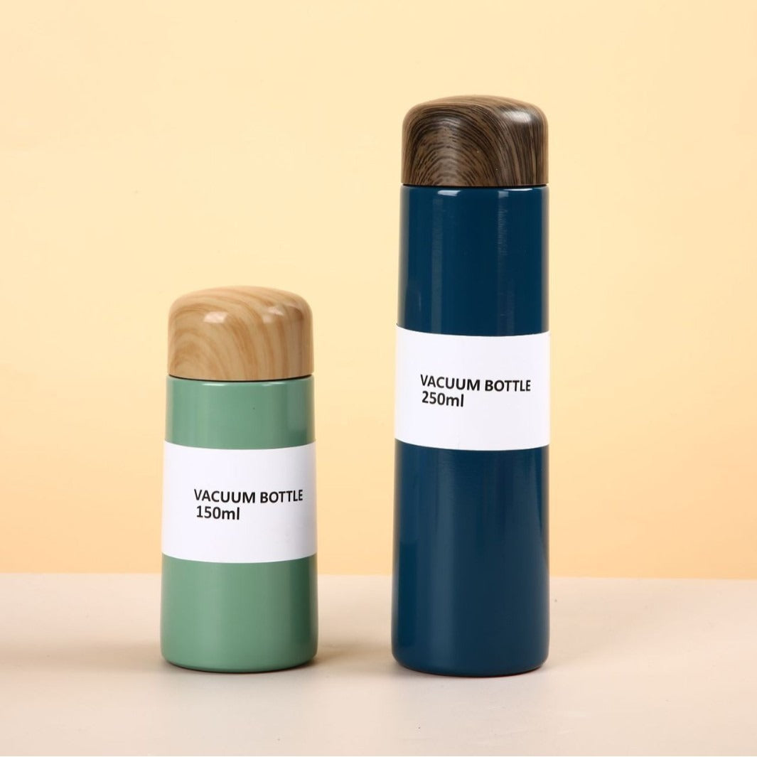 Women vacuum-insulated water bottle with innovative wooden lid Kalsten