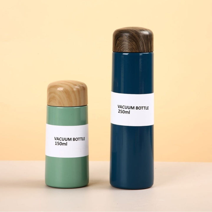 Women vacuum-insulated water bottle with innovative wooden lid Kalsten