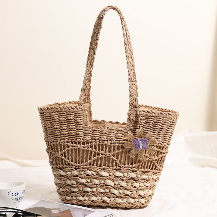 Braided basket bag with decorative flower appliqué Kalsten
