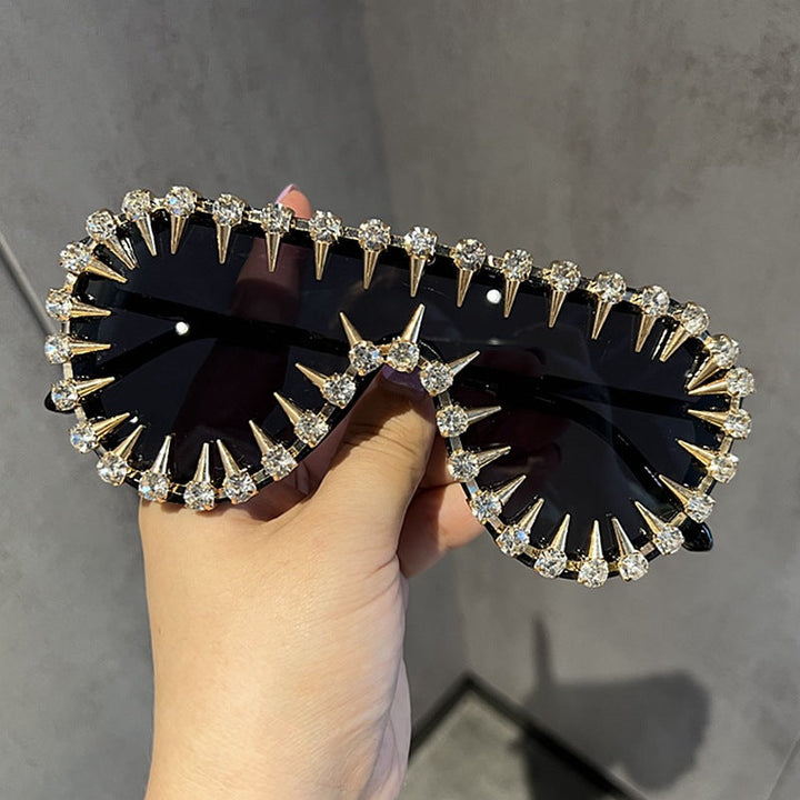 Ladies extravagantly designed cat-eye sunglasses with glitter accents Kalsten