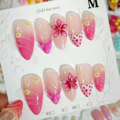 Nail art set with floral patterns and ombre effects Acalora