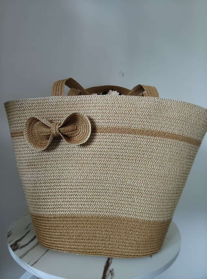 Elegant straw bag with decorative bow closure Kalsten