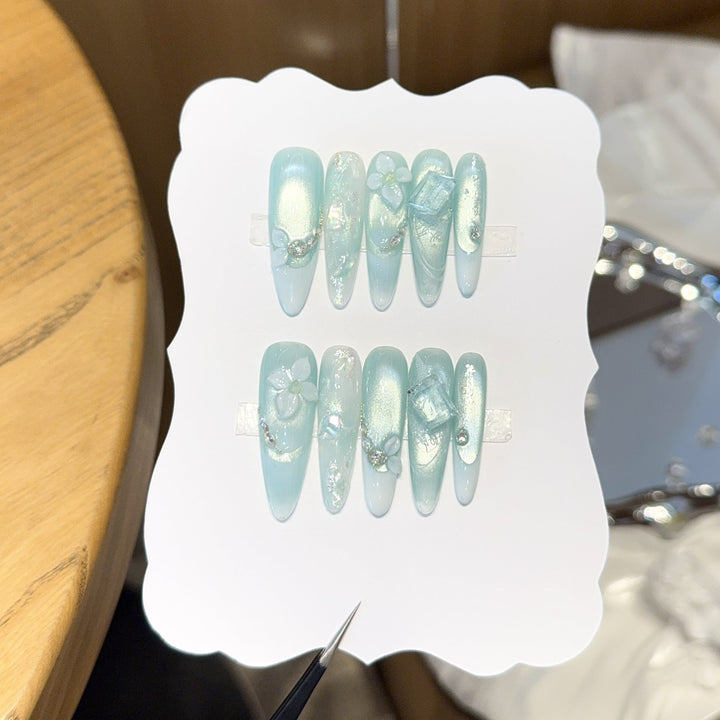 Artificial nails with floral designs and glitter effects Kalsten