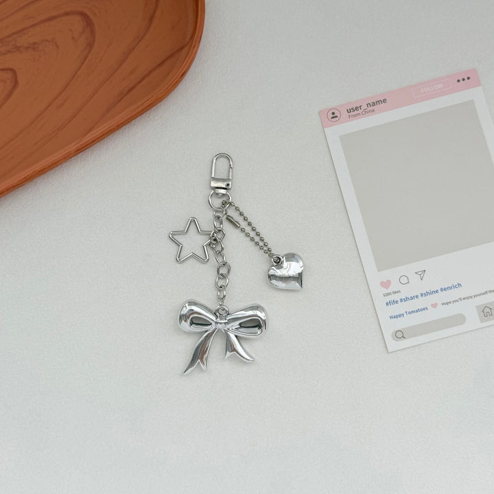 Playful Bow and Star Keychain Kalsten