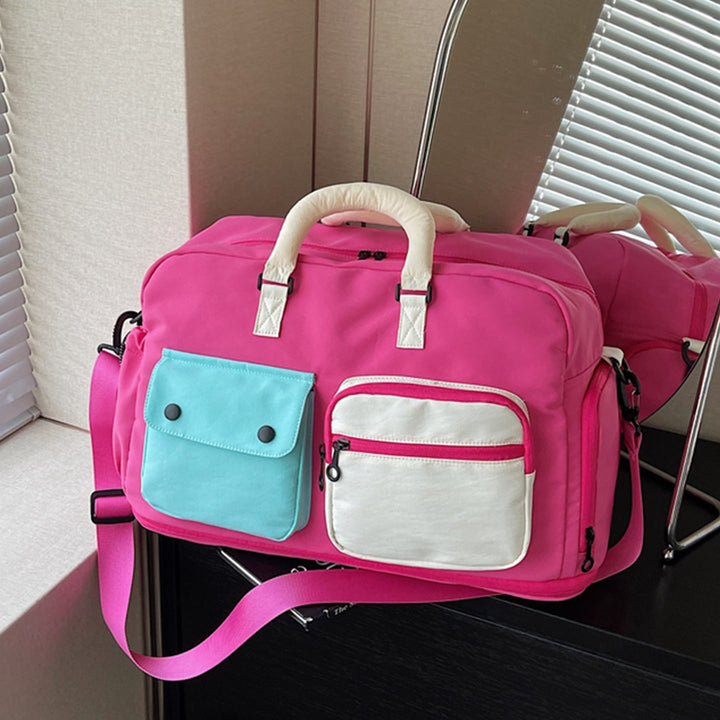Sporty travel bag with multifunctional outer pockets Kalsten