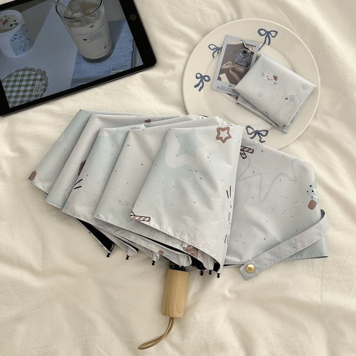 Women's compact folding umbrella with cute Kalsten motif