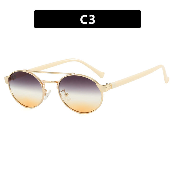 Ladies fashionable sunglasses in stylish round design with golden accents Kalsten