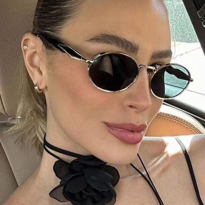 Women's fashionable sunglasses in elegant oval design with trendy accents Kalsten