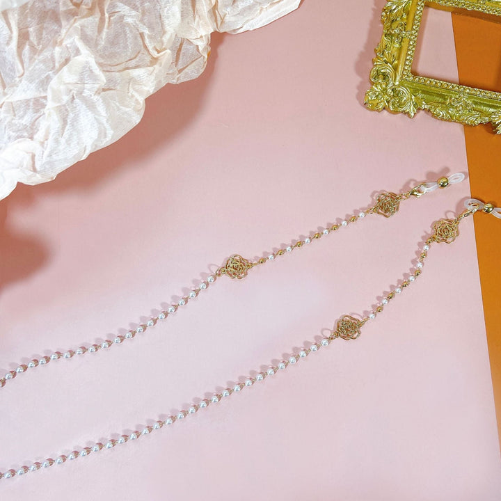 Sparkling glasses holder chain with pearls and floral pendants Kalsten