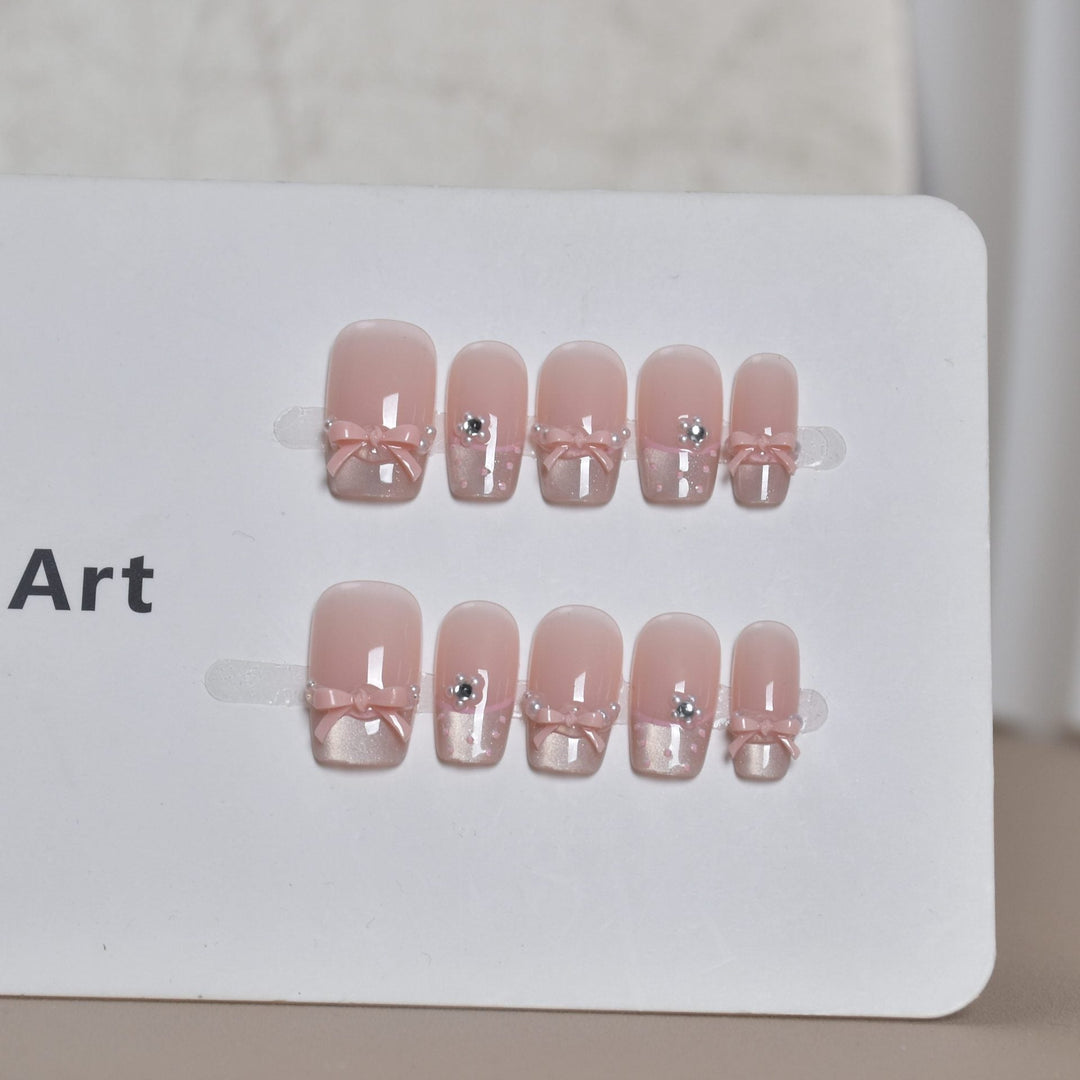 Elegant French Tip Press-On Nail Art with Bow Accents Kalsten
