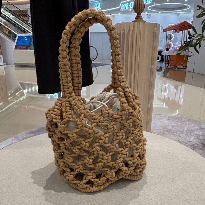 Fashionable handbag made of braided material Kalsten