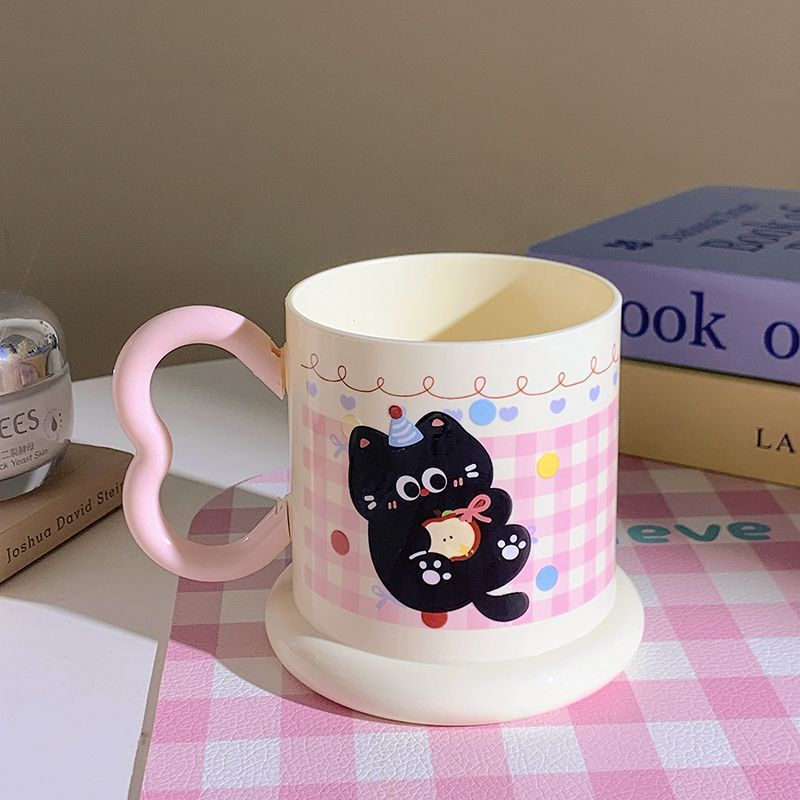 Ceramic mug with playful cat motif Kalsten