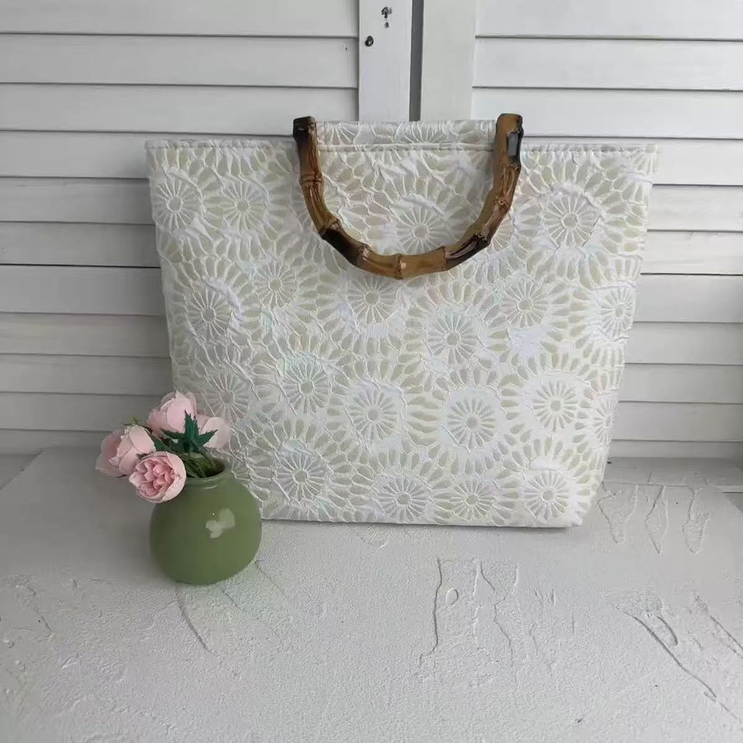 Exclusive and handcrafted beach bag with bamboo handles Kalsten