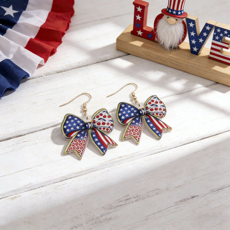 Women's eye-catching statement earrings made of acrylic with patriotic bow pendant Kalsten