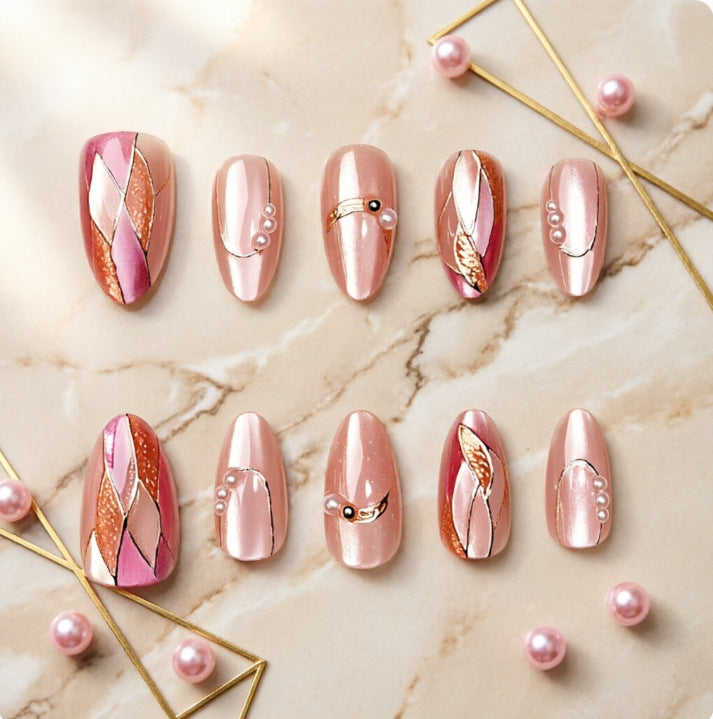 Artificial nails with elegant pearl and gold accents Kalsten