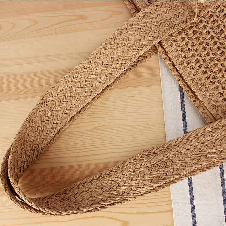 Eco-friendly straw tote bag with elegant tassel detail Kalsten