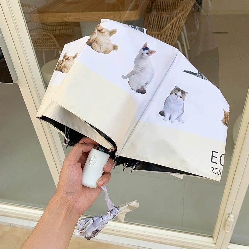 Ladies folding umbrella with playful animal design Kalsten