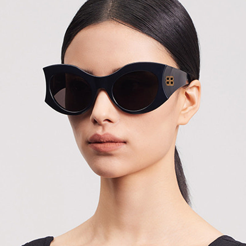 Ladies stylish Cat-Eye sunglasses with high-gloss design and protective lenses Kalsten