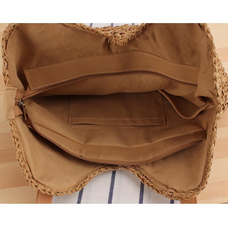 Generous straw shoulder bag with leather handles Kalsten