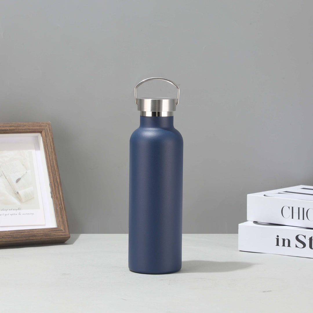 Women's stainless steel insulated drinking bottle with sustainable bamboo lid Kalsten