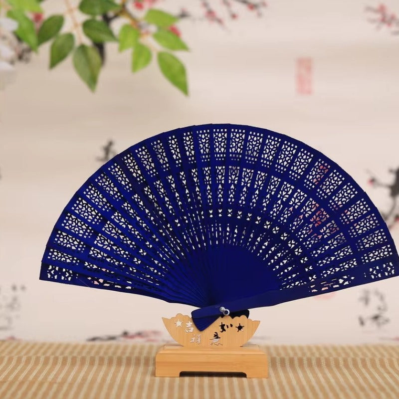 Ladies fine fan made of artistically pierced paper Kalsten