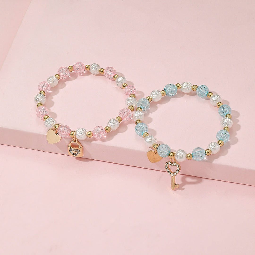 Playful bracelet set with heart and key design Kalsten