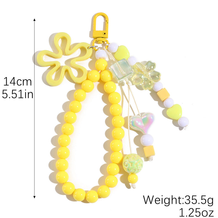 Playful keychain with flower and butterfly details Kalsten