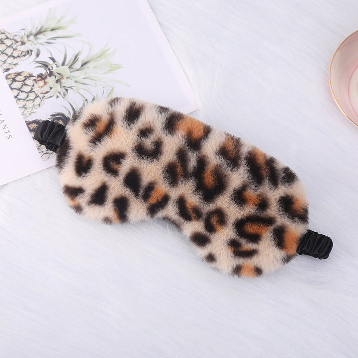 Women's cuddly faux fur sleep mask with heart-embossed surface and gathered comfort band Kalsten