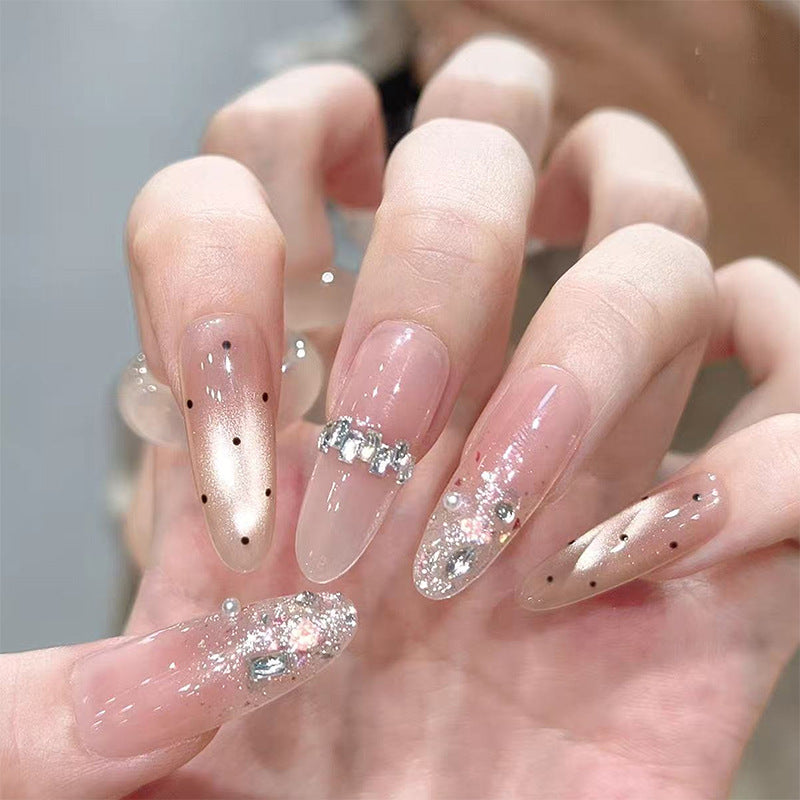 Artificial nail set with sparkling glitter and elegant jewelry details Acalora