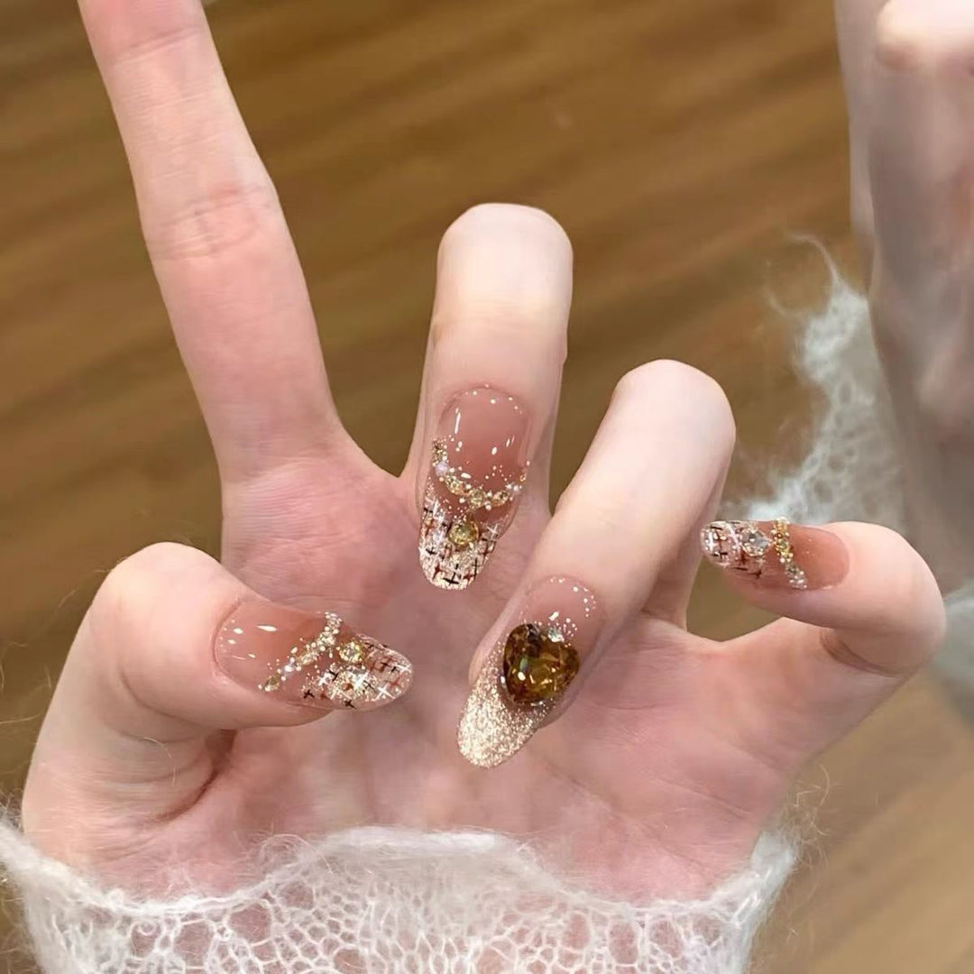 Artificial nails with glitter and heart accents Kalsten