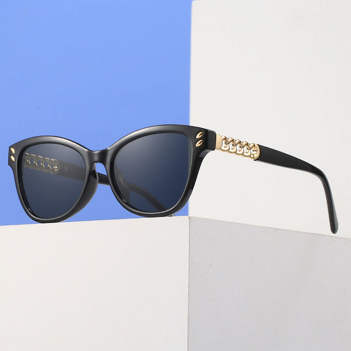 Ladies fashionable cat-eye sunglasses with luxurious chain accents Kalsten