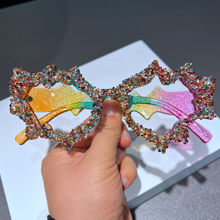 Ladies creative sunglasses in an extravagant design with glitter embellishments Kalsten