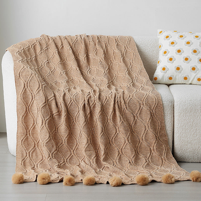 Ladies knit blanket with decorative pom poms Kalsten