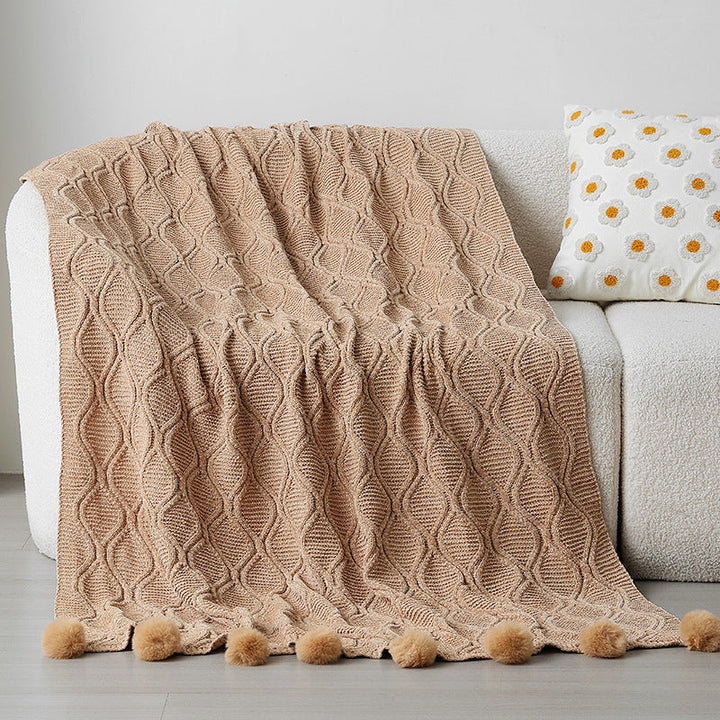 Ladies knit blanket with decorative pom poms Kalsten