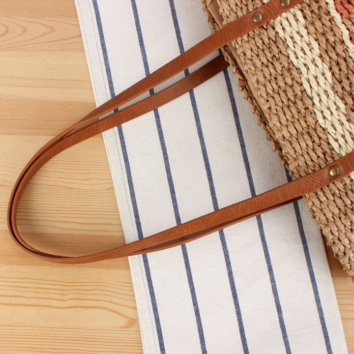 Tote bag made of braided natural material with elegant leather handles Kalsten