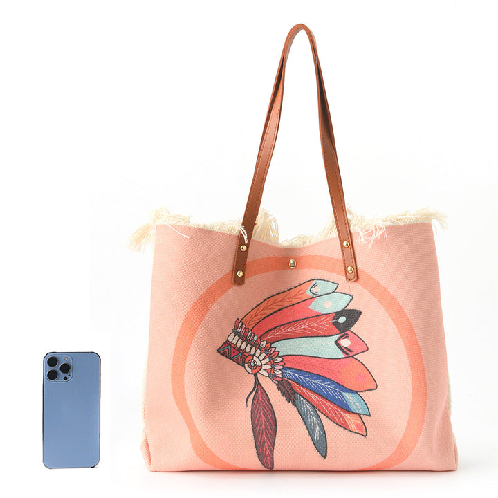 Beach bag with floral pattern and fringes Kalsten