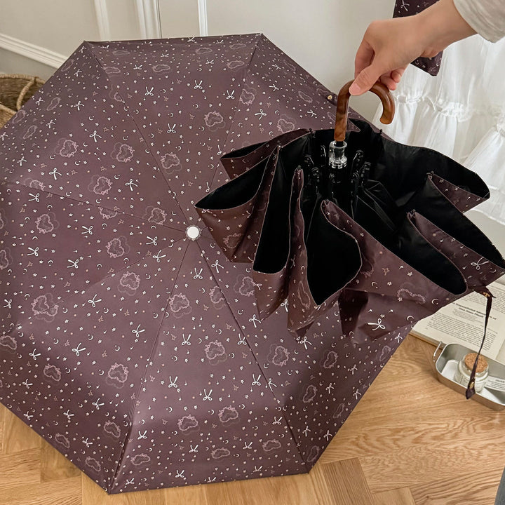 Women's folding umbrella with elegant pendant design Kalsten
