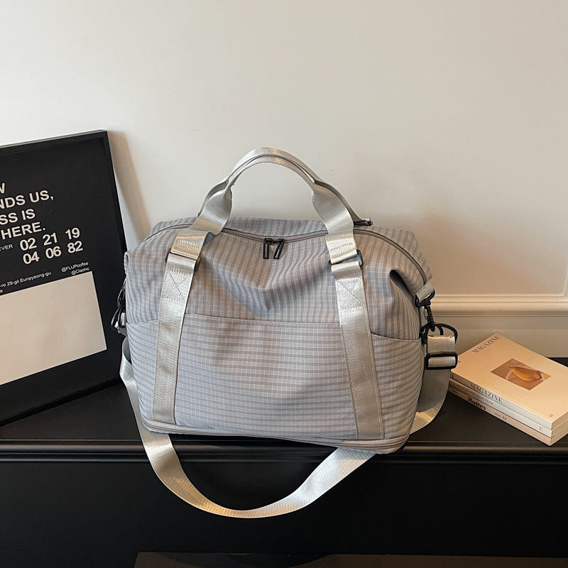 Sporty travel bag with practical storage and adjustable shoulder straps Kalsten